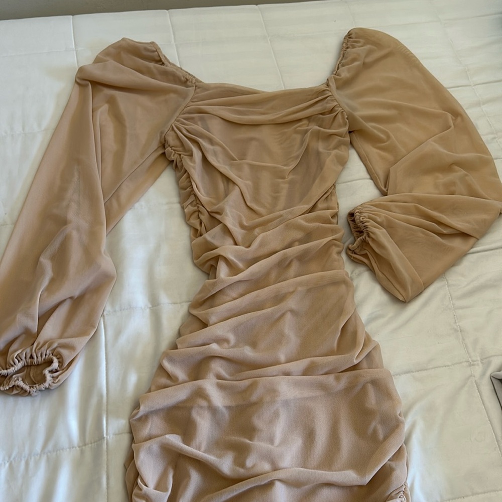 Tan skin tight dress with mesh sleeves